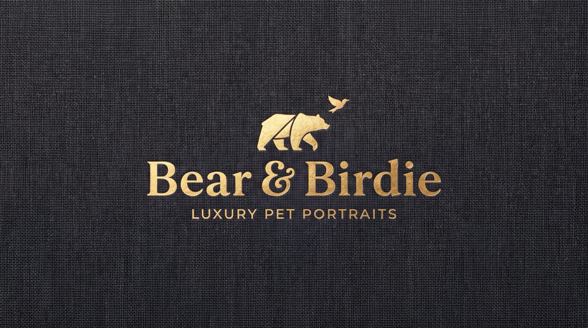 Bear & Birdie — gold-foil logo plaque